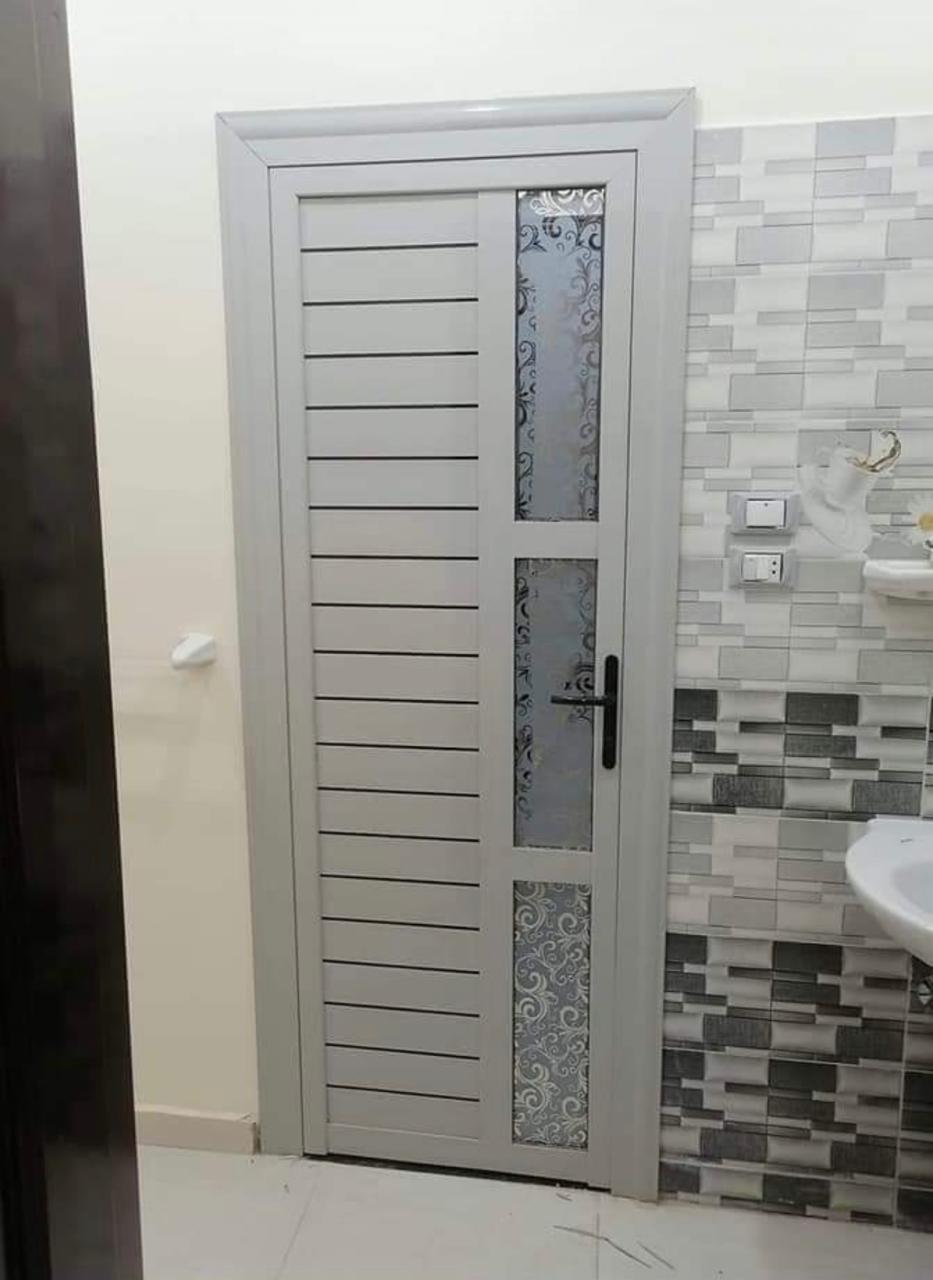 Aluminum cabinet door panel finished in HPL material for kitchens